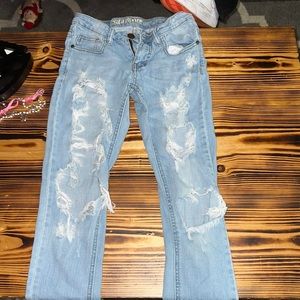 light blue ripped jeans